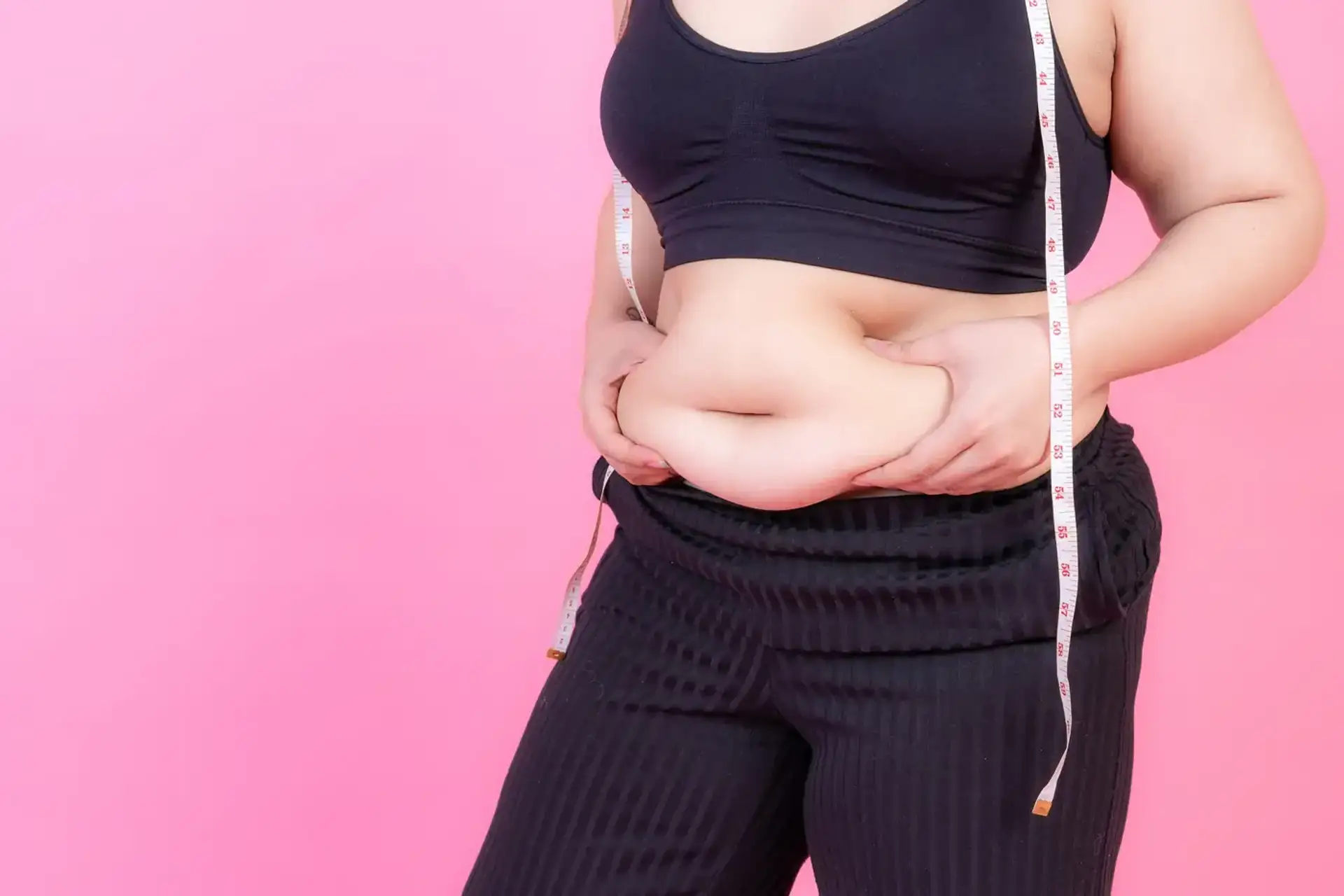 overweight-squeeze-belly-fat-with-measure-tape-her-neck