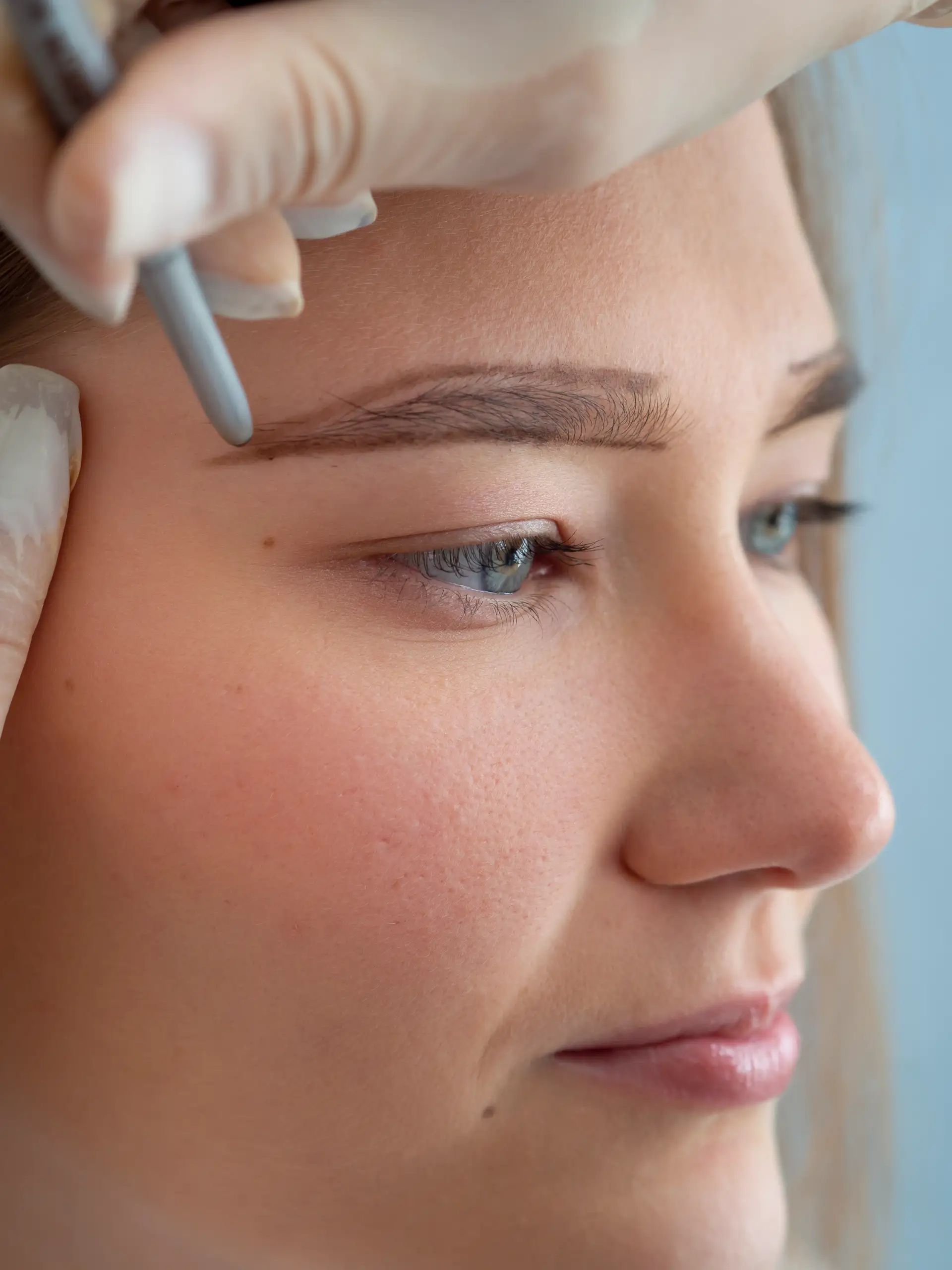 client-going-through-microblading-treatment